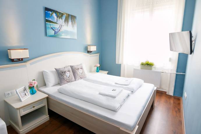 Imagen de la habitación del Hotel Full Moon. Foto 16