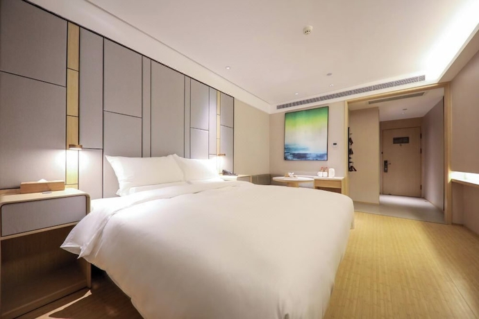 Imagen de la habitación del Hotel Full Season, Qingdao. Foto 4
