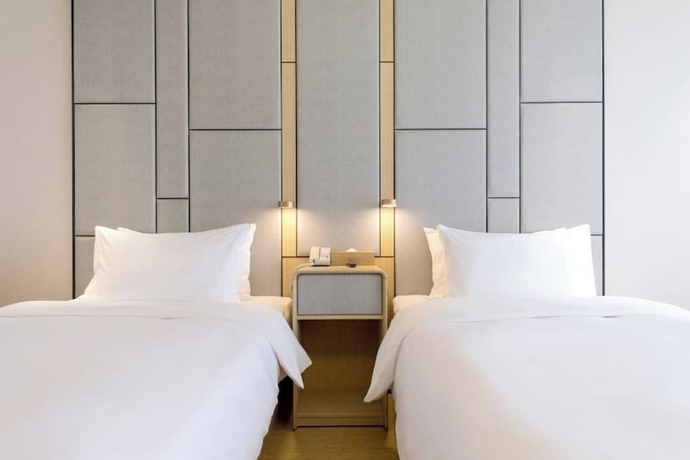 Imagen de la habitación del Hotel Full Season, Qingdao. Foto 6