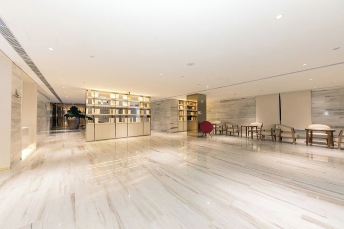 Imagen de los interiores del Hotel Full Season, Qingdao. Foto 14