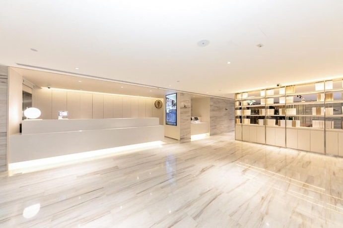 Imagen de los interiores del Hotel Full Season, Qingdao. Foto 15