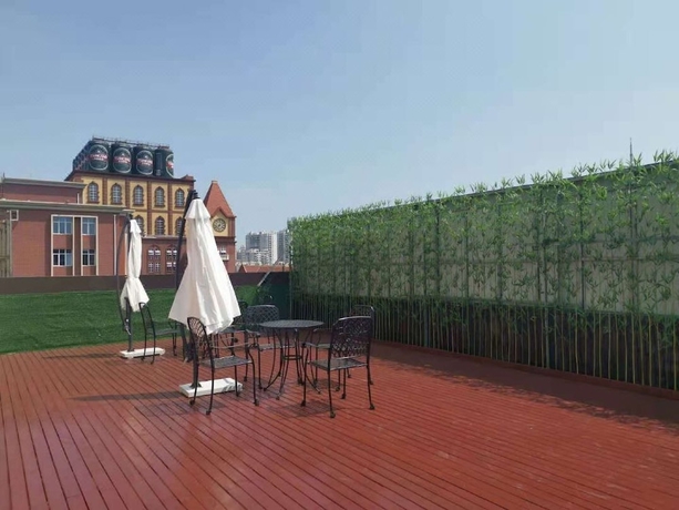 Imagen de la habitación del Hotel Full Season, Qingdao. Foto 9
