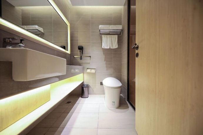Imagen de la habitación del Hotel Full Season, Qingdao. Foto 11