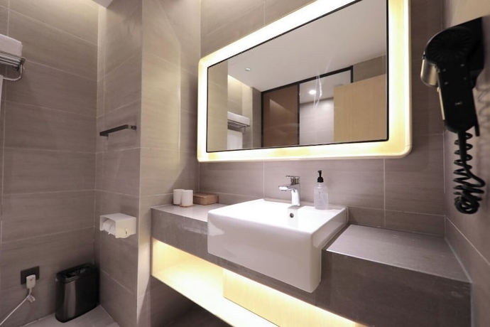 Imagen de la habitación del Hotel Full Season, Qingdao. Foto 12