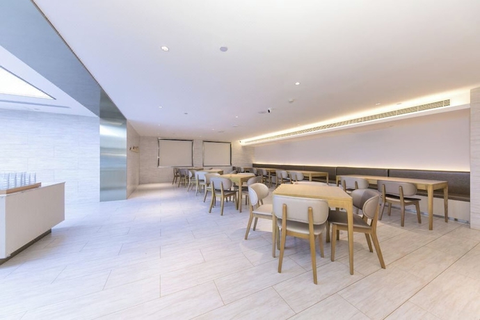 Imagen del bar/restaurante del Hotel Full Season, Qingdao. Foto 3