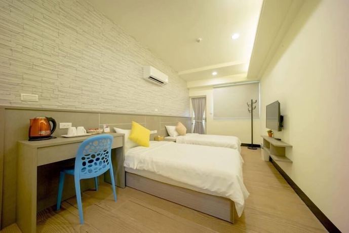 Imagen de la habitación del Hotel Full house, Jinning. Foto 8