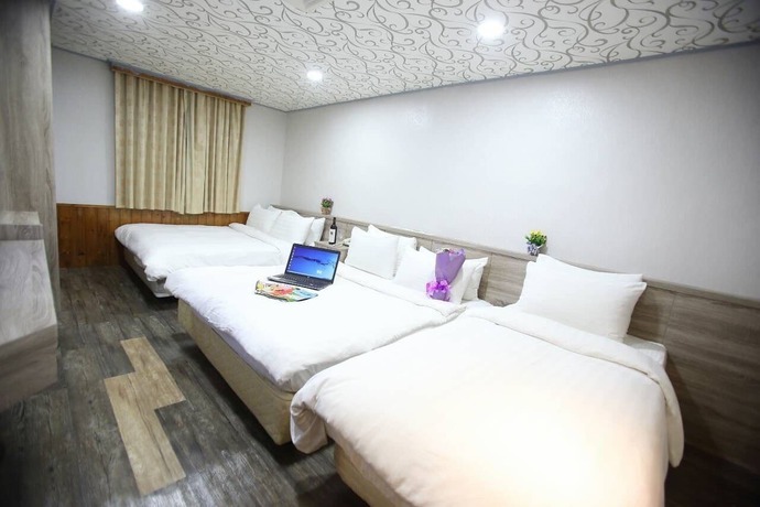 Imagen de la habitación del Hotel Funhouse Hsinchu. Foto 8