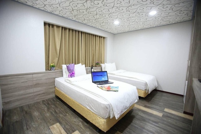 Imagen de la habitación del Hotel Funhouse Hsinchu. Foto 9