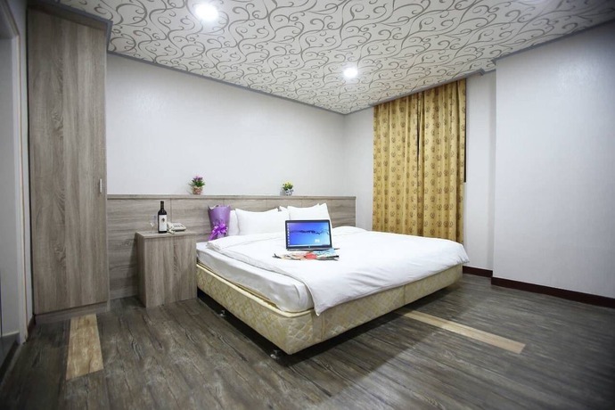 Imagen de la habitación del Hotel Funhouse Hsinchu. Foto 10