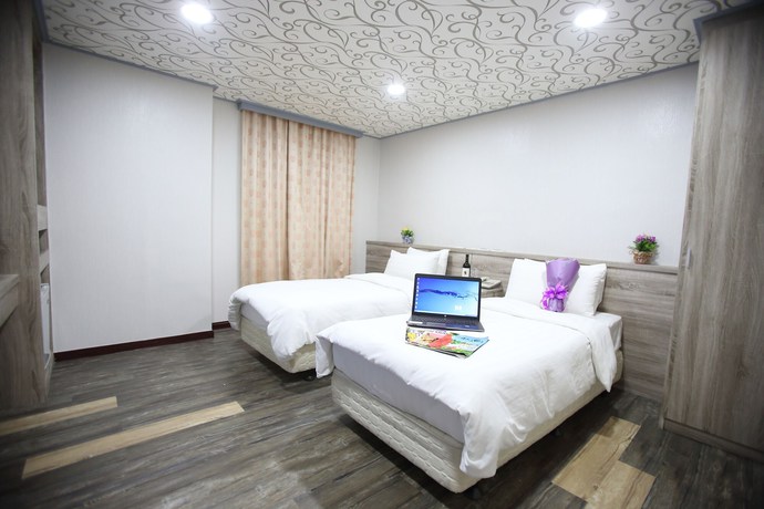 Imagen de la habitación del Hotel Funhouse Hsinchu. Foto 11