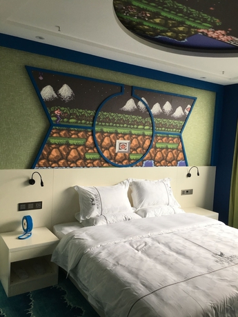 Imagen de la habitación del Hotel Fun-loving Theme Of Tengchong. Foto 2