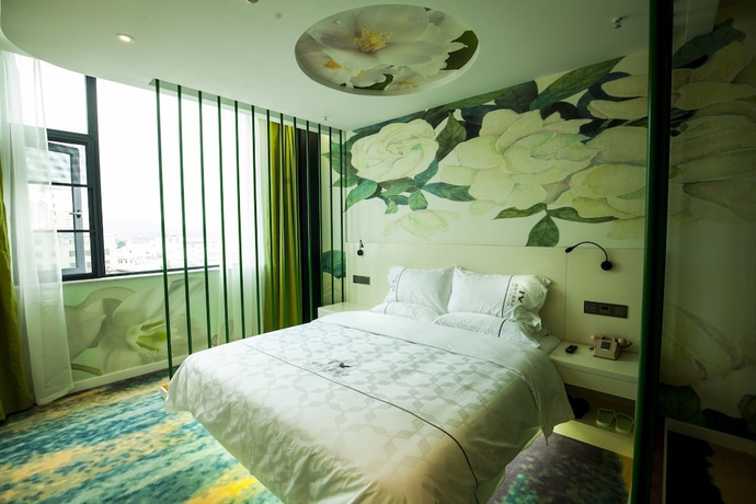 Imagen de la habitación del Hotel Fun-loving Theme Of Tengchong. Foto 12