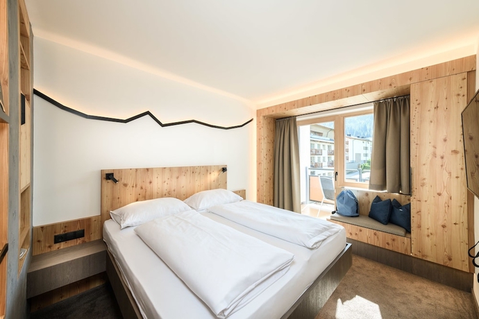 Imagen de la habitación del Hotel Funsport-, Bike- and Skihotelanlage Tauernhof. Foto 2