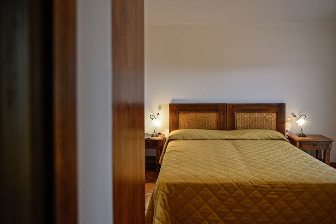 Imagen de la habitación del Hotel Funtanaena. Foto 16