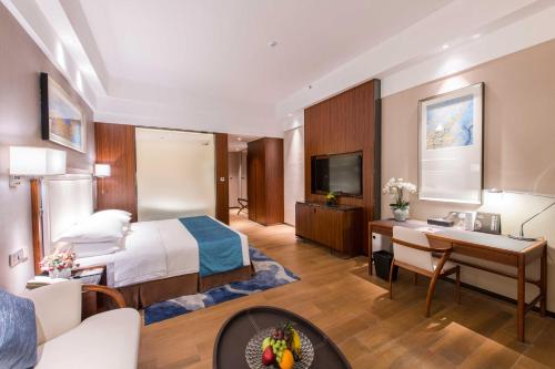 Imagen de la habitación del Hotel Funyard Huizhou. Foto 16