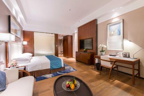 Imagen de la habitación del Hotel Funyard Huizhou. Foto 17
