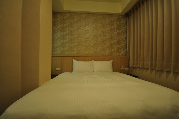 Imagen de la habitación del Hotel Fupin. Foto 14
