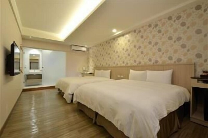 Imagen de la habitación del Hotel Fupin. Foto 15