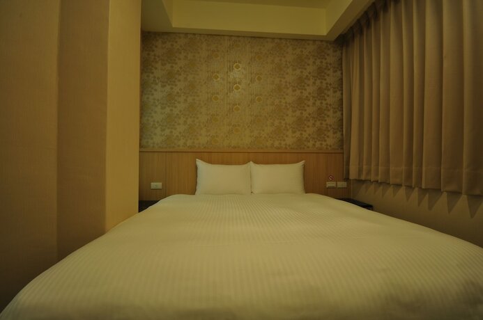 Imagen de la habitación del Hotel Fupin. Foto 17