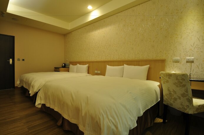 Imagen de la habitación del Hotel Fupin. Foto 18