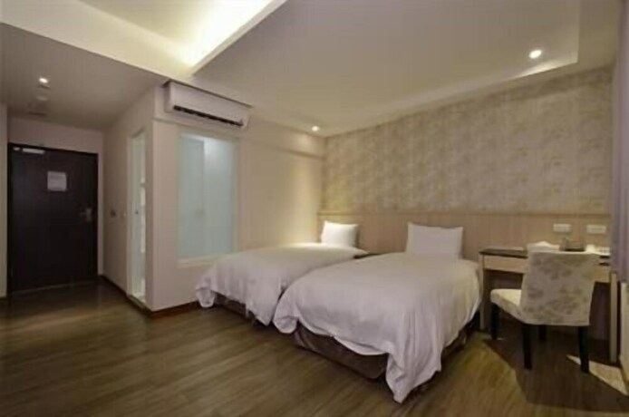 Imagen de la habitación del Hotel Fupin. Foto 19