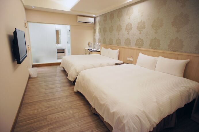 Imagen de la habitación del Hotel Fupin. Foto 20
