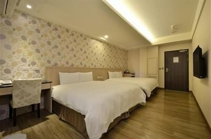 Imagen de la habitación del Hotel Fupin. Foto 25