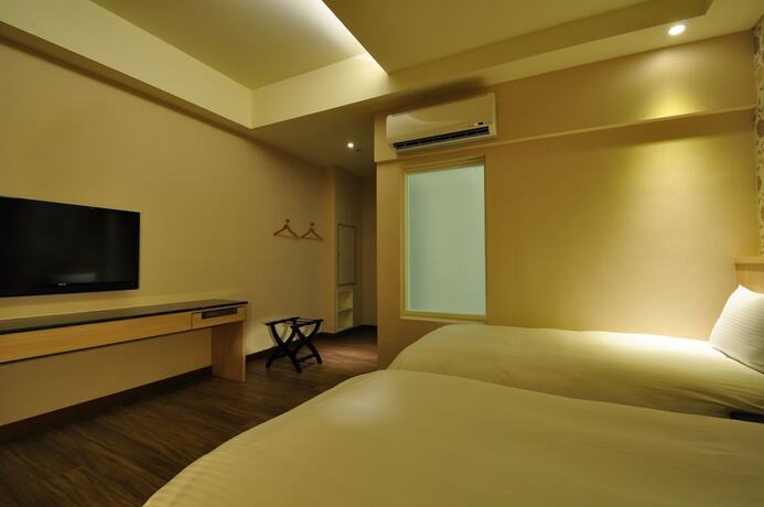 Imagen de la habitación del Hotel Fupin. Foto 26