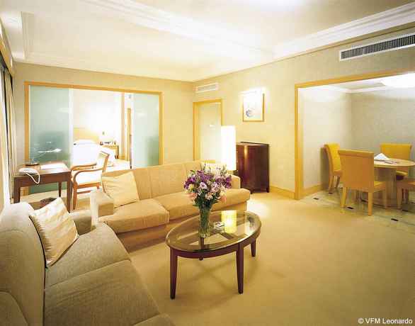 Imagen de la habitación del Hotel Furama Dalian. Foto 2