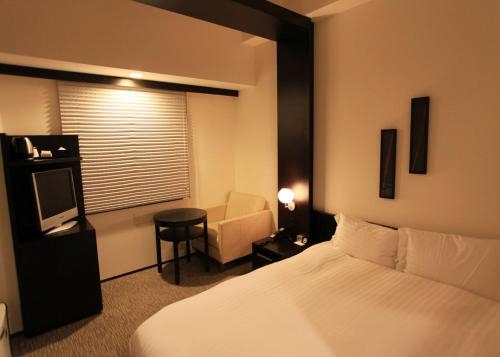 Imagen de la habitación del Hotel Furano Natulux. Foto 6