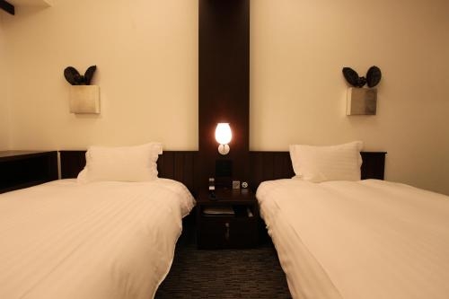 Imagen de la habitación del Hotel Furano Natulux. Foto 8