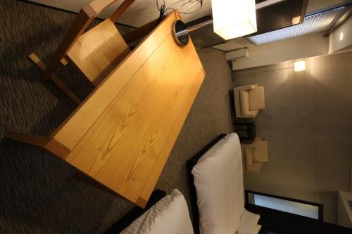 Imagen de la habitación del Hotel Furano Natulux. Foto 10