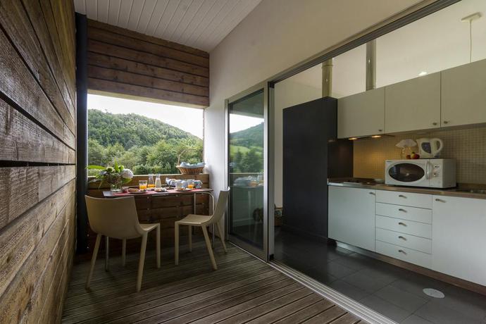 Imagen de los interiores del Hotel Furnas Lake Forest Living. Foto 8