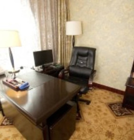 Imagen de la habitación del Hotel Fusheng. Foto 9