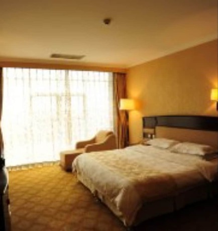 Imagen de la habitación del Hotel Fusheng. Foto 13