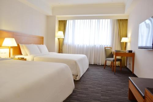 Imagen de la habitación del Hotel Fushin Taichung. Foto 7