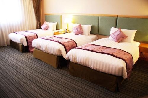 Imagen de la habitación del Hotel Fushin - Tainan. Foto 8