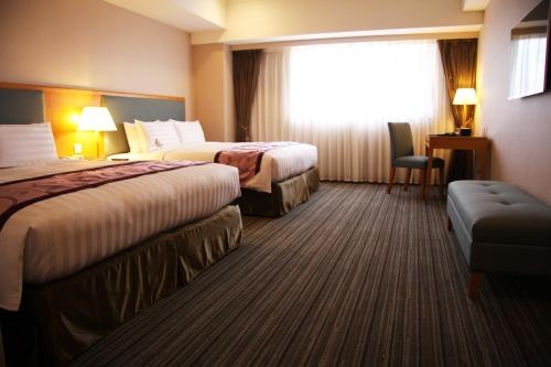 Imagen de la habitación del Hotel Fushin - Tainan. Foto 9