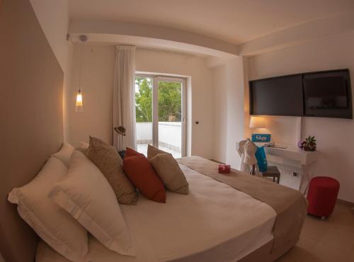 Imagen de la habitación del Hotel Futura Club Spiagge Bianche. Foto 19