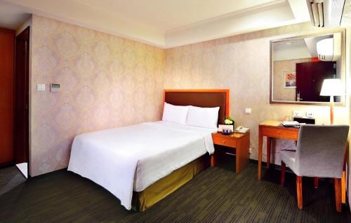 Imagen de la habitación del Hotel Fuward Tainan. Foto 6