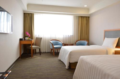 Imagen de la habitación del Hotel Fuward Tainan. Foto 9