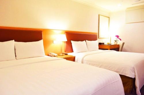 Imagen de la habitación del Hotel Fuward Tainan. Foto 10