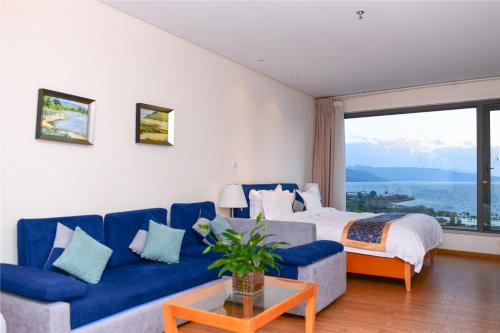 Imagen de la habitación del Hotel Fuxian Lake Junlin Holiday. Foto 8