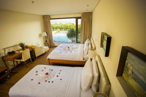 Imagen de la habitación del Hotel Fuxian Lake Mengju Holiday. Foto 7