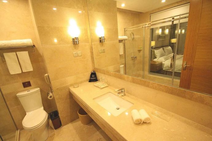Imagen de la habitación del Hotel Fuyi Zhongshan. Foto 10