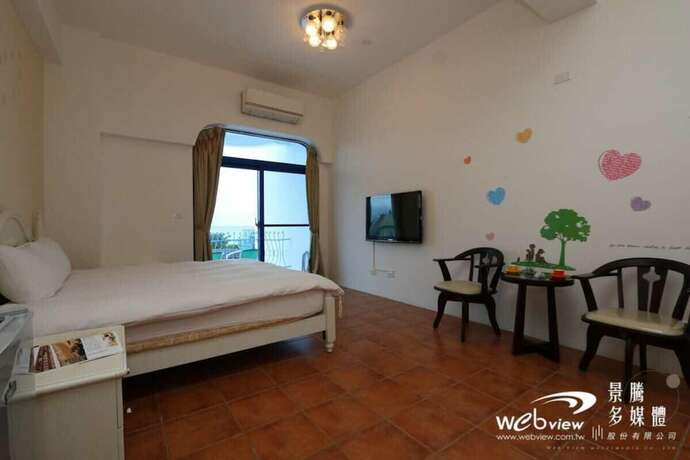 Imagen de la habitación del Hotel Fuyue Sea View. Foto 25