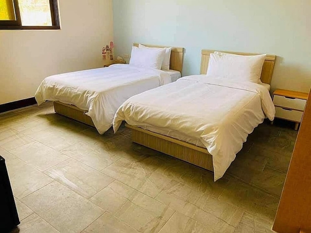 Imagen de la habitación del Hotel Fuzhongju Homestay. Foto 11