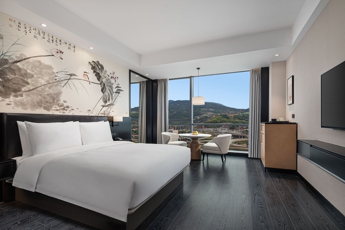 Imagen de la habitación del Hotel Fuzhou Mawei Yiho. Foto 11