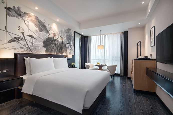 Imagen de la habitación del Hotel Fuzhou Mawei Yiho. Foto 13