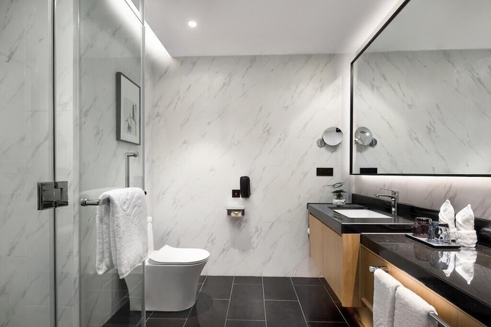 Imagen de la habitación del Hotel Fuzhou Mawei Yiho. Foto 14